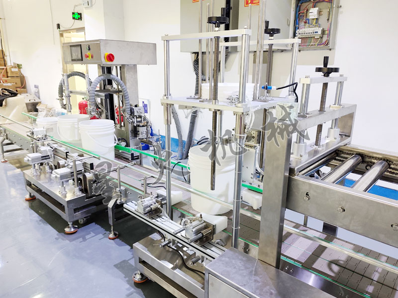 5-30kg大容量液体称重灌装压盖生产线